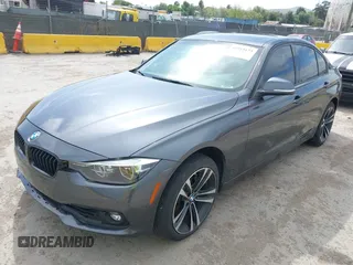 2018 BMW 3 Series 330i with VIN WBA8B9C56JEE80803, listed as a IAAI auction lot 42015173 with 98,124 mi miles and . Bid and sale history available at DreamBid. Image 2.