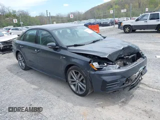 2018 Volkswagen Passat S z VIN 1VWAA7A35JC005419, wystawiony jako IAAI lot #42076908 z przebiegiem 89 571 mil mil oraz . Historia ofert i sprzedaży dostępna na DreamBid. Obrazek 1.