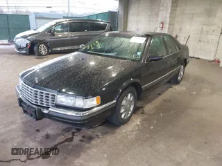 1997 Cadillac Seville Luxury SLS with VIN 1G6KS52YXVU816736, listed as a IAAI auction lot 41854220 with 107,091 mi miles. Bid and sale history available at carsss.com. Image 17.