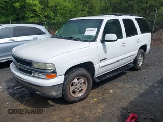 2003 Chevrolet Tahoe LT with VIN 1GNEC13Z03J150595, listed as a IAAI auction lot 42091129 with 247,732 mi miles. Bid and sale history available at carsss.com. Image 2.
