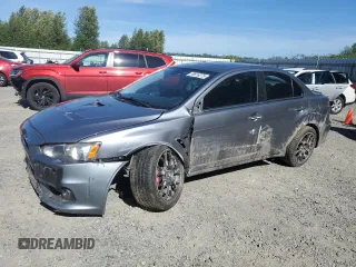 2015 Mitsubishi Lancer Evolution MR z VIN JA32W5FV2FU010441, wystawiony jako Copart lot #58816275 z przebiegiem 72 531 mil mil oraz Tytuł czysty. Historia ofert i sprzedaży dostępna na DreamBid. Obrazek 1.