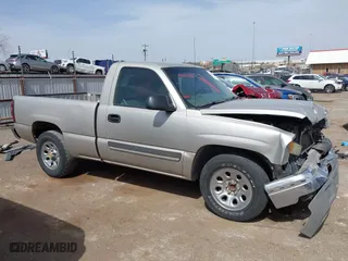 2005 Chevrolet Silverado 1500 Work Truck with VIN 1GCEC14X45Z106318, listed as a IAAI auction lot 41819033 with 153,997 mi miles. Bid and sale history available at carsss.com. Image 14.