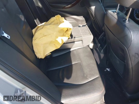 2013 BMW 3 Series 328i xDrive with VIN WBA3B5G56DNS02207, listed as a IAAI auction lot 42213935 with Not provided miles and . Bid and sale history available at DreamBid. Image 8.