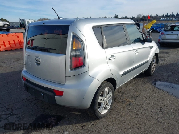 2011 Kia Soul + with VIN KNDJT2A22B7266928, listed as a IAAI auction lot 41572553 with 155,214 mi miles. Bid and sale history available at carsss.com. Image 4.