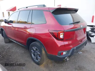 2022 Honda Passport TrailSport with VIN 5FNYF8H61NB015883, listed as a IAAI auction lot 40662061 with 19,212 mi miles and . Bid and sale history available at carsss.com. Image 3.