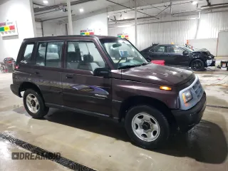1998 Chevrolet Tracker z VIN 2CNBJ1362W6919635, wystawiony jako Copart lot #56894355 z przebiegiem 140 298 mil mil oraz Szkoda całkowita • Salvage title. Historia ofert i sprzedaży dostępna na DreamBid. Obrazek 4.