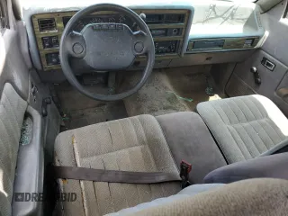 1995 Dodge Dakota z VIN 1B7GL23Y9SS385794, wystawiony jako Copart lot #63360094 z przebiegiem 394 435 mil mil oraz Szkoda całkowita • Salvage title. Historia ofert i sprzedaży dostępna na DreamBid. Obrazek 8.