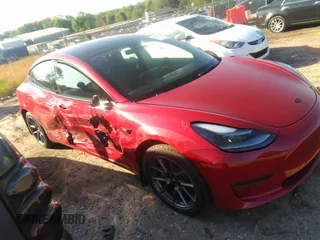 2022 Tesla Model 3 Long Range with VIN 5YJ3E1EB4NF171972, listed as a IAAI auction lot 42026031 with 40,489 mi miles and . Bid and sale history available at DreamBid. Image 1.