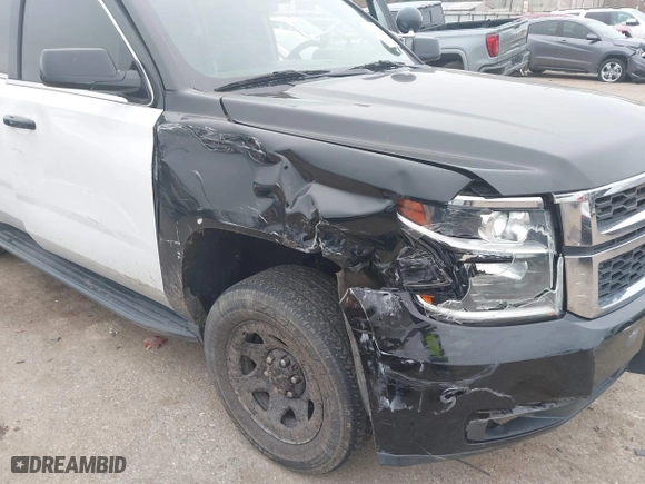 2018 Chevrolet Tahoe Commercial with VIN 1GNLCDEC1JR312458, listed as a IAAI auction lot 41371563 with 114,086 mi miles. Bid and sale history available at carsss.com. Image 6.