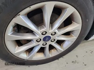 2017 Ford Fusion SE z VIN 3FA6P0H76HR151451, wystawiony jako IAAI lot #42787592 z przebiegiem 90 386 mil mil oraz . Historia ofert i sprzedaży dostępna na DreamBid. Obrazek 12.