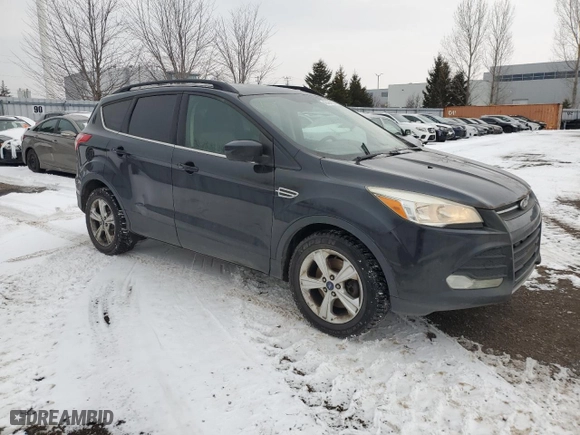 2015 Ford Escape SE with VIN 1FMCU9GXXFUB84143, listed as a Copart auction lot 42494185 with 292,439 mi miles and Salvage Title. Bid and sale history available at carsss.com. Image 4.
