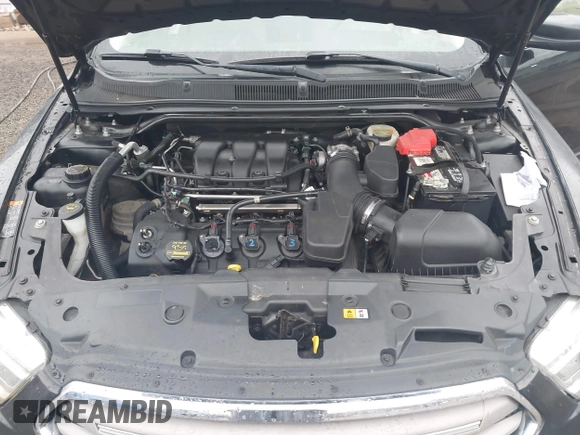 2013 Ford Taurus SEL with VIN 1FAHP2E83DG107913, listed as a IAAI auction lot 42007575 with 147,240 mi miles. Bid and sale history available at carsss.com. Image 10.