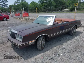 1982 Chrysler LeBaron z VIN 1C3BC55D2CG145033, wystawiony jako IAAI lot #42145500 z przebiegiem 20 643 mil mil oraz . Historia ofert i sprzedaży dostępna na DreamBid. Obrazek 2.