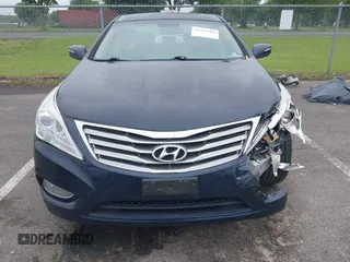 2013 Hyundai Azera with VIN KMHFG4JGXDA227569, listed as a IAAI auction lot 42384304 with 151,007 mi miles and . Bid and sale history available at DreamBid. Image 12.