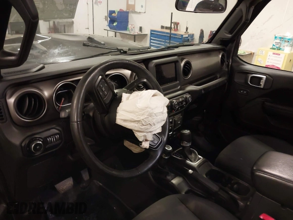 2019 Jeep Wrangler Unlimited Sport S z VIN 1C4HJXDG6KW598997, wystawiony jako IAAI lot #42473098 z przebiegiem 59 232 mil mil oraz . Historia ofert i sprzedaży dostępna na DreamBid. Obrazek 16.
