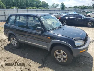 1997 Toyota RAV4 with VIN JT3HP10V3V7059398, listed as a Copart auction lot 54709995 with 186,467 mi miles and Salvage title. Bid and sale history available at DreamBid. Image 4.