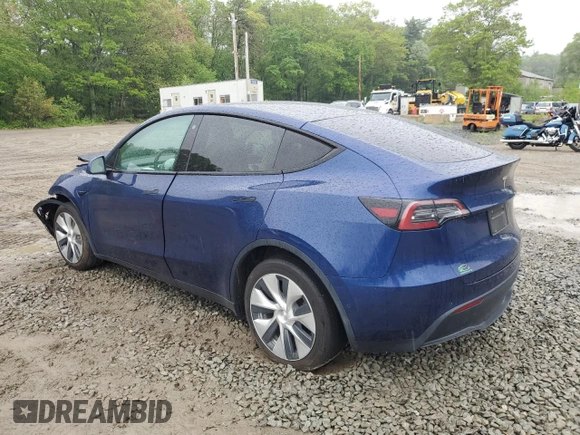 2022 Tesla Model Y Long Range z VIN 7SAYGDEE6NF318808, wystawiony jako Copart lot #57219915 z przebiegiem Nie podano mil oraz Szkoda całkowita • Salvage title. Historia ofert i sprzedaży dostępna na DreamBid. Obrazek 2.