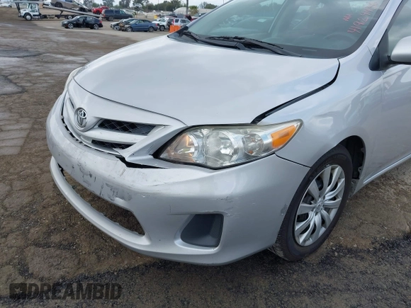 2012 Toyota Corolla L with VIN 2T1BU4EE9CC803165, listed as a IAAI auction lot 41924436 with 257,724 mi miles. Bid and sale history available at carsss.com. Image 6.