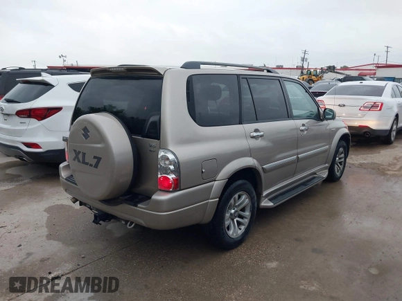 2004 Suzuki XL-7 LX with VIN JS3TX92V244114426, listed as a IAAI auction lot 42112014 with 169,377 mi miles. Bid and sale history available at carsss.com. Image 4.