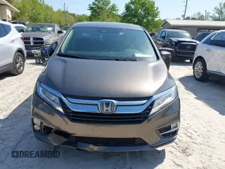2020 Honda Odyssey Touring with VIN 5FNRL6H87LB002202, listed as a IAAI auction lot 42015741 with 182,051 mi miles and . Bid and sale history available at DreamBid. Image 12.