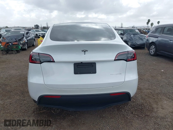 2023 Tesla Model Y Long Range with VIN 7SAYGDEE6PA064162, listed as a IAAI auction lot 41533464 with 24,337 mi miles. Bid and sale history available at carsss.com. Image 17.