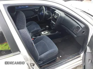 2003 Hyundai Sonata with VIN KMHWF25S13A830754, listed as a IAAI auction lot 41409518 with 207,849 mi miles. Bid and sale history available at carsss.com. Image 5.