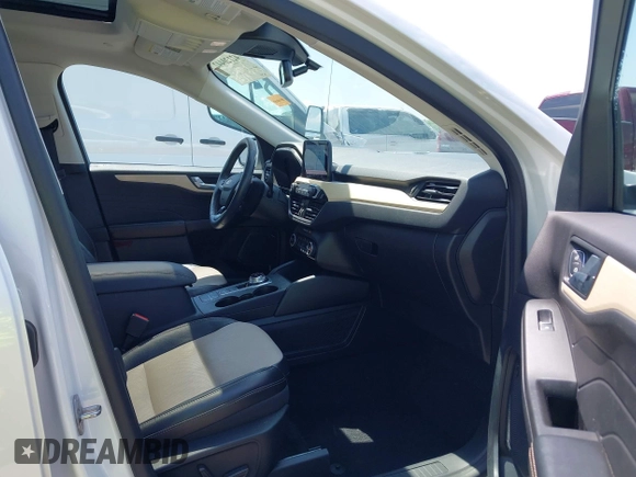 2021 Ford Escape Titanium with VIN 1FMCU9J91MUA29407, listed as a IAAI auction lot 42120442 with 19,314 mi miles and . Bid and sale history available at DreamBid. Image 5.