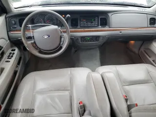 2005 Ford Crown Victoria LX with VIN 2FAFP74W95X166593, listed as a Copart auction lot 80544294 with 178,591 mi miles and Clean Title. Bid and sale history available at carsss.com. Image 8.