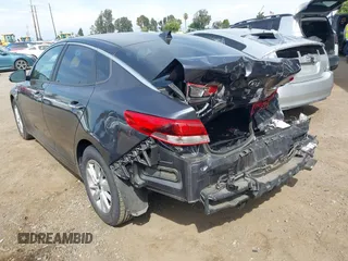 2018 Kia Optima LX z VIN KNAGT4L36J5216858, wystawiony jako IAAI lot #42149047 z przebiegiem 121 845 mil mil oraz . Historia ofert i sprzedaży dostępna na DreamBid. Obrazek 3.