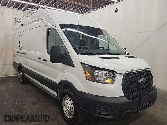 2023 Ford Transit Cargo z VIN 1FTBW3U84PKB20116, wystawiony jako IAAI lot #42782997 z przebiegiem 6 591 mil mil oraz . Historia ofert i sprzedaży dostępna na DreamBid. Obrazek 19.