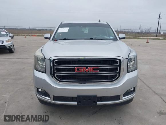 2015 GMC Yukon SLT with VIN 1GKS1BKC3FR253184, listed as a IAAI auction lot 41574610 with 152,543 mi miles. Bid and sale history available at carsss.com. Image 12.