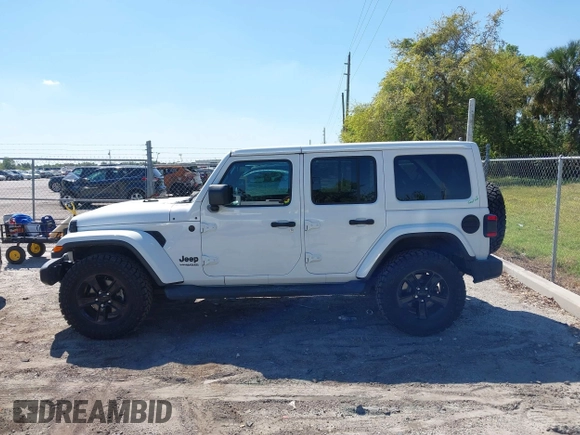 2020 Jeep Wrangler Unlimited Sahara with VIN 1C4HJXEN4LW330867, listed as a IAAI auction lot 41790709 with 63,151 mi miles. Bid and sale history available at carsss.com. Image 14.