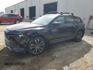 2023 Mazda CX-50 Premium z VIN 7MMVABDY8PN114761, wystawiony jako Copart lot #49092805 z przebiegiem 27 528 mil mil oraz Tytuł czysty. Historia ofert i sprzedaży dostępna na DreamBid. Obrazek 1.