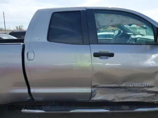 2018 Toyota Tundra 2WD SR with VIN 5TFRM5F16JX133735, listed as a IAAI auction lot 41818455 with 148,456 mi miles. Bid and sale history available at carsss.com. Image 13.