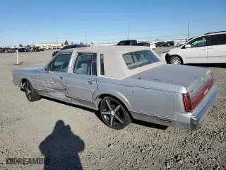 1986 Lincoln Town Car with VIN 1LNBP96FXGY728775, listed as a Copart auction lot 72062924 with 69,980 mi miles and Salvage Title. Bid and sale history available at carsss.com. Image 2.