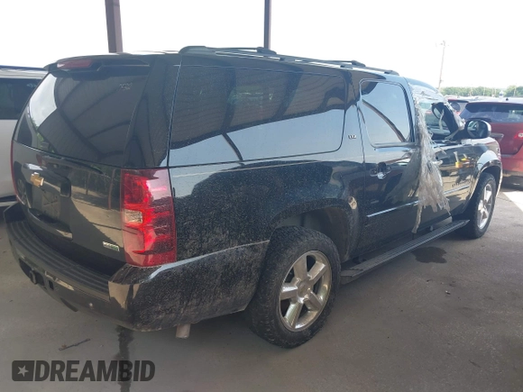 2008 Chevrolet Suburban LTZ with VIN 1GNFK16328R161721, listed as a IAAI auction lot 42130017 with 242,266 mi miles. Bid and sale history available at carsss.com. Image 4.