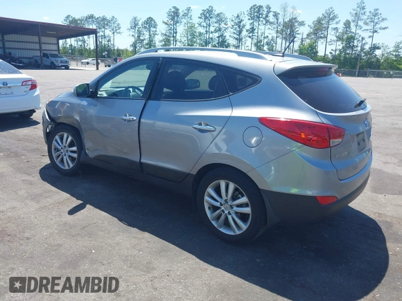 2013 Hyundai Tucson GLS with VIN KM8JU3AC4DU588062, listed as a IAAI auction lot 42080348 with 76,937 mi miles. Bid and sale history available at carsss.com. Image 3.