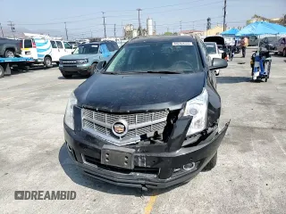 2012 Cadillac SRX Luxury Collection z VIN 3GYFNAE38CS638136, wystawiony jako Copart lot #60292655 z przebiegiem 124 569 mil mil oraz Szkoda całkowita • Salvage title. Historia ofert i sprzedaży dostępna na DreamBid. Obrazek 14.