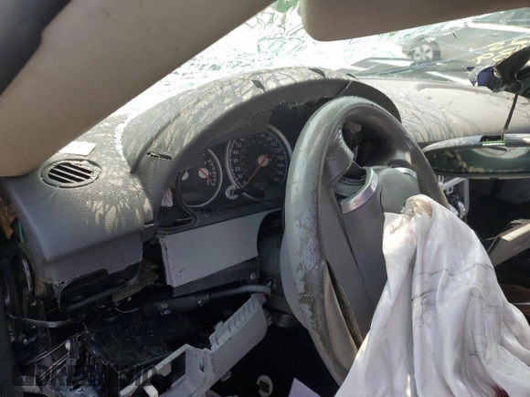 2004 Chrysler Crossfire с VIN 1C3AN69L24X002839, выставлен на аукционе Copart как лот 59307905 с пробегом 196 673 миль миль и Списание • Salvage title. История ставок и продаж доступна на DreamBid. Изображение 9.