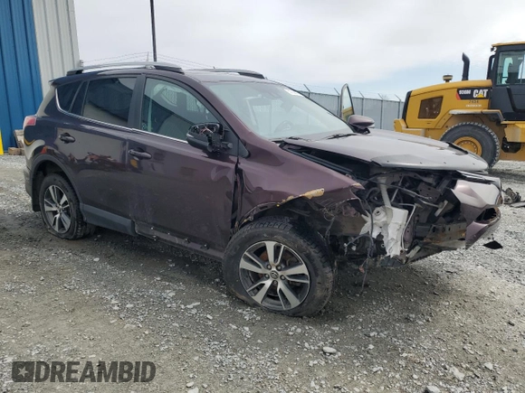 2018 Toyota RAV4 XLE with VIN 2T3RFREV2JW841670, listed as a Copart auction lot 50700675 with Not Provided miles and Salvage Title. Bid and sale history available at DreamBid. Image 4.