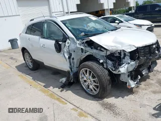 2014 Cadillac SRX Performance Collection z VIN 3GYFNFE34ES653572, wystawiony jako IAAI lot #41936473 z przebiegiem 119 097 mil mil oraz . Historia ofert i sprzedaży dostępna na DreamBid. Obrazek 1.