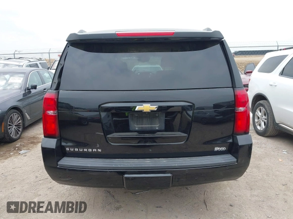 2015 Chevrolet Suburban LT with VIN 1GNSCJKC1FR304656, listed as a IAAI auction lot 42071124 with 133,140 mi miles. Bid and sale history available at carsss.com. Image 16.