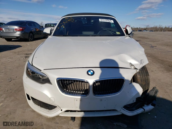 2015 BMW 2 Series 228i xDrive with VIN WBA1K7C57FV235082, listed as a Copart auction lot 87412554 with 75,061 mi miles and Salvage Title. Bid and sale history available at carsss.com. Image 5.