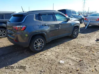 2018 Jeep Compass Latitude with VIN 3C4NJDBBXJT458268, listed as a IAAI auction lot 40965832 with 86,553 mi miles and . Bid and sale history available at DreamBid. Image 4.