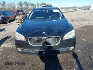 2011 BMW 7 Series 740i with VIN WBAKA4C58BC392020, listed as a IAAI auction lot 41314751 with 116,553 mi miles. Bid and sale history available at carsss.com. Image 12.