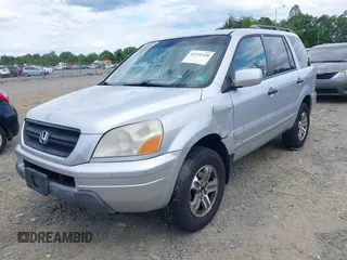 2005 Honda Pilot EX-L with VIN 5FNYF18625B062816, listed as a IAAI auction lot 42221428 with 258,651 mi miles and . Bid and sale history available at DreamBid. Image 2.