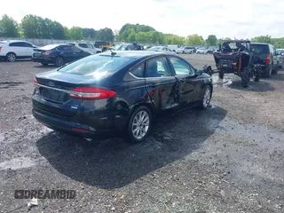 2017 Ford Fusion SE with VIN 3FA6P0HD6HR302875, listed as a IAAI auction lot 42105022 with 105,437 mi miles and . Bid and sale history available at DreamBid. Image 4.