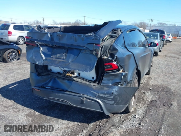 2022 Tesla Model X with VIN 7SAXCDE52NF345835, listed as a IAAI auction lot 41823522 with 24,401 mi miles and . Bid and sale history available at DreamBid. Image 6.
