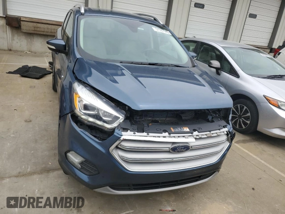 2018 Ford Escape Titanium with VIN 1FMCU9J93JUC01903, listed as a Copart auction lot 57337045 with 59,276 mi miles and Salvage title. Bid and sale history available at DreamBid. Image 5.