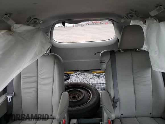 2011 Toyota Sienna XLE AAS with VIN 5TDYK3DCXBS063948, listed as a Copart auction lot 59776695 with 305,799 mi miles and Salvage title. Bid and sale history available at DreamBid. Image 10.